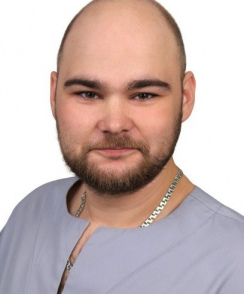 Романченко Александр Сергеевич стоматолог